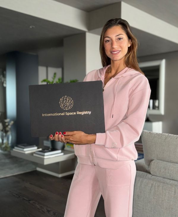 Woman holding her name a star gift box