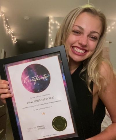 happy woman with her star-naming gift